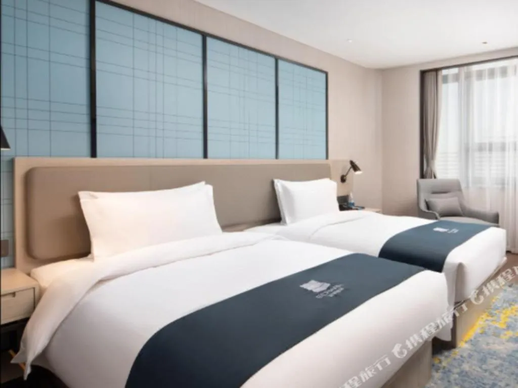 Bed in Echarm Hotel Hengshui 2nd High School High-speed Railway Station