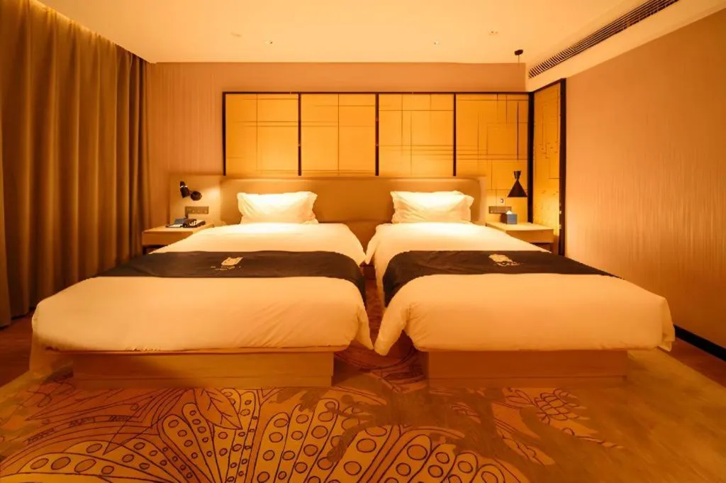 Bed in Echarm Hotel Hengshui 2nd High School High-speed Railway Station