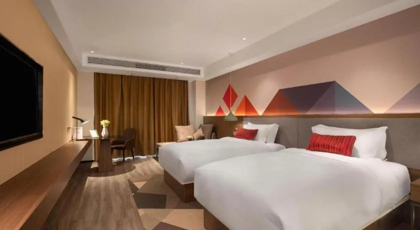 Bed in Borrman Hotel Guilin North Railway Station Zhonghao International