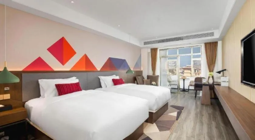 Bed in Borrman Hotel Guilin North Railway Station Zhonghao International