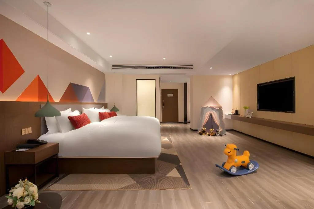 Bed in Borrman Hotel Guilin North Railway Station Zhonghao International