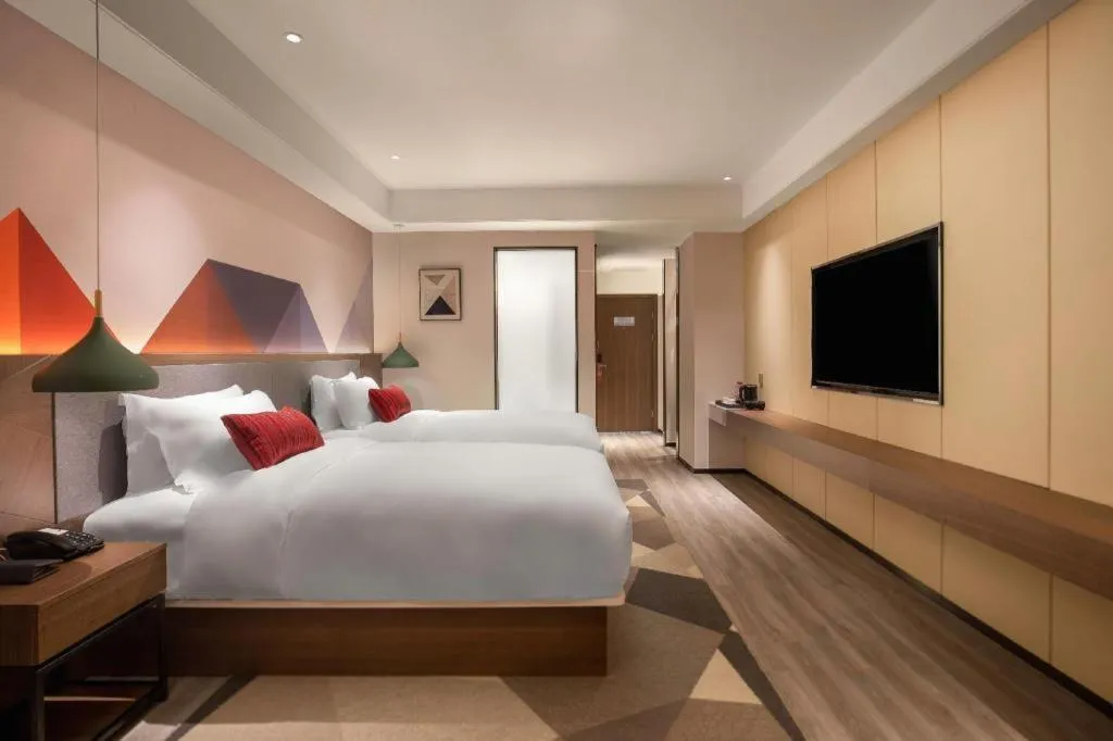 Bed in Borrman Hotel Guilin North Railway Station Zhonghao International