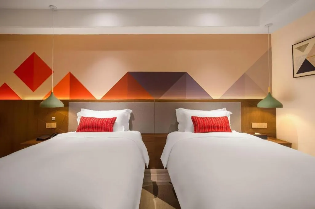 Bed in Borrman Hotel Guilin North Railway Station Zhonghao International