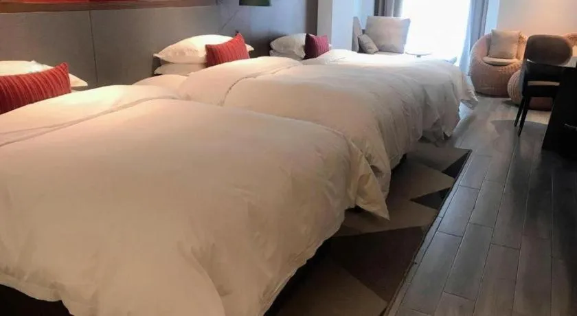 Bed in Borrman Hotel Guilin North Railway Station Zhonghao International