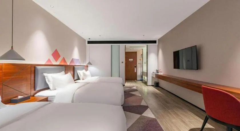 Bed in Borrman Hotel Guilin North Railway Station Zhonghao International