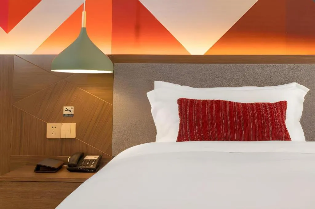 Bed in Borrman Hotel Guilin North Railway Station Zhonghao International