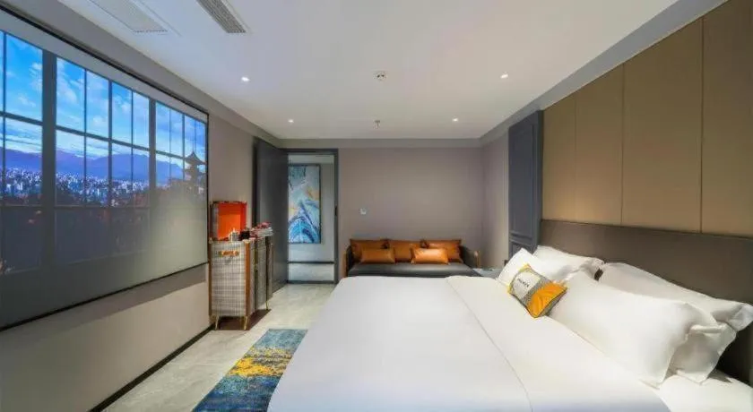 Bed in Premier City Comfort Hotel Suizhou Wuyue Plaza