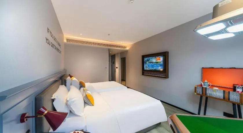 Bed in Premier City Comfort Hotel Suizhou Wuyue Plaza