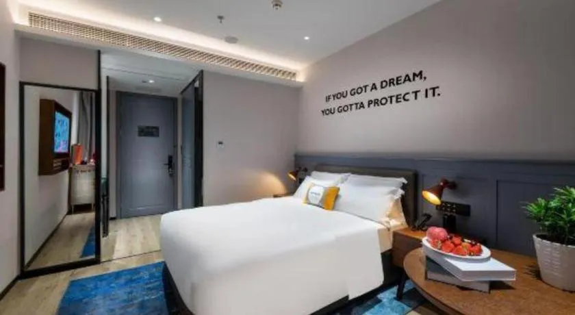 Bed in Premier City Comfort Hotel Suizhou Wuyue Plaza