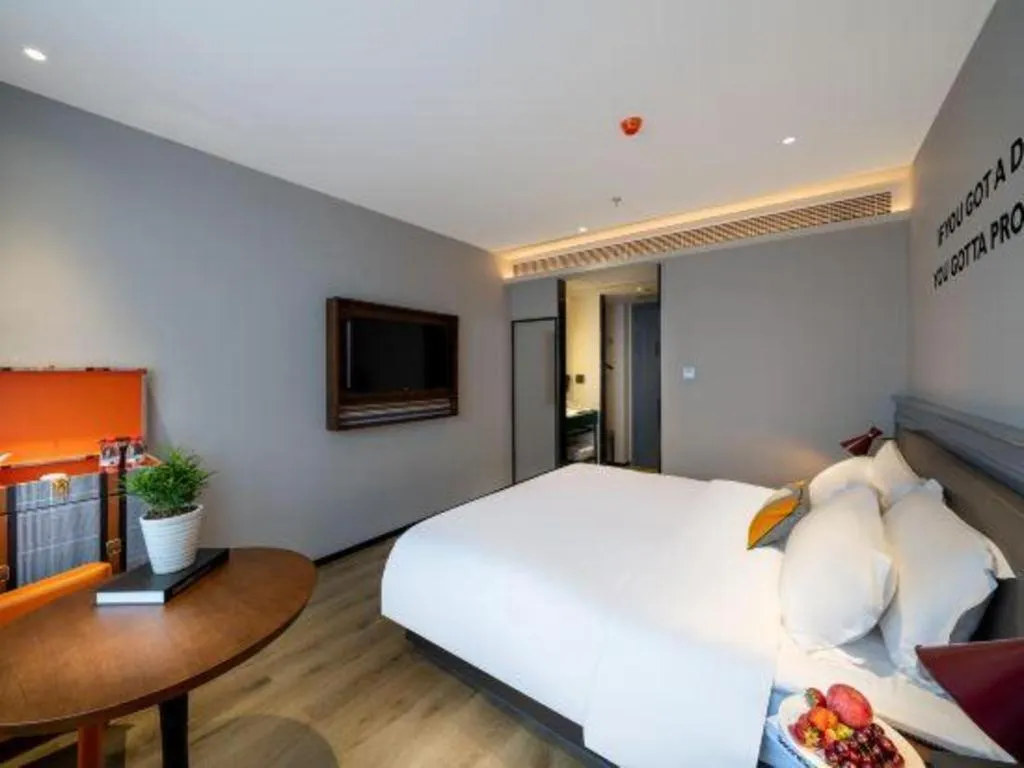 Bed in Premier City Comfort Hotel Suizhou Wuyue Plaza