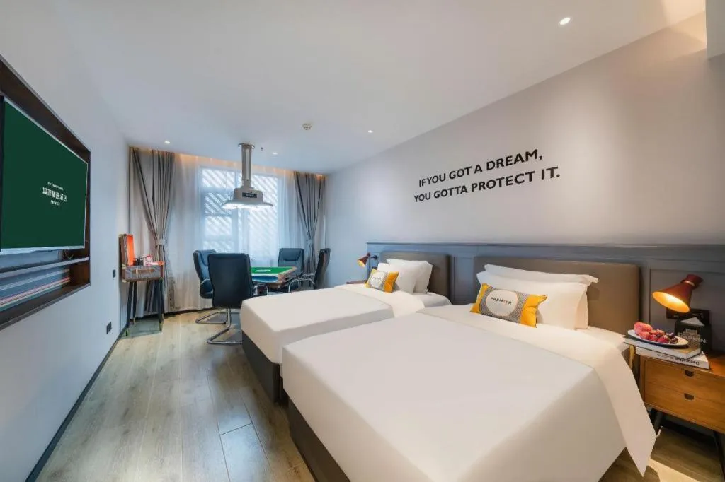 Bed in Premier City Comfort Hotel Suizhou Wuyue Plaza