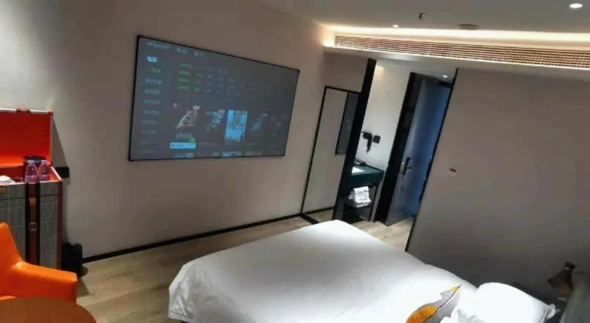 Bed in Premier City Comfort Hotel Suizhou Wuyue Plaza