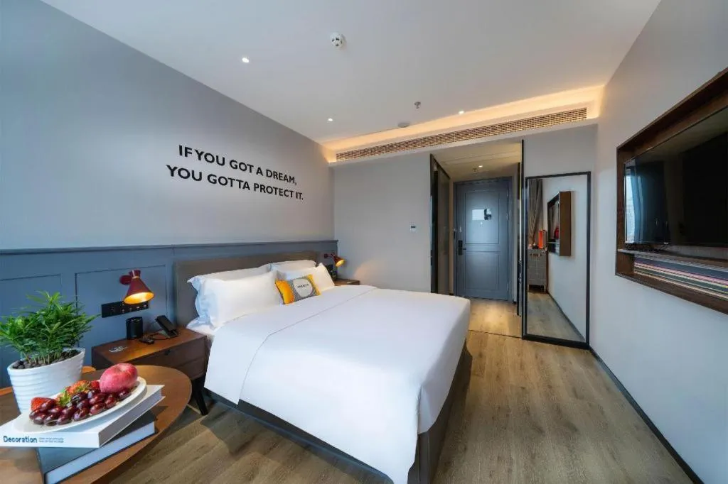 Bed in Premier City Comfort Hotel Suizhou Wuyue Plaza