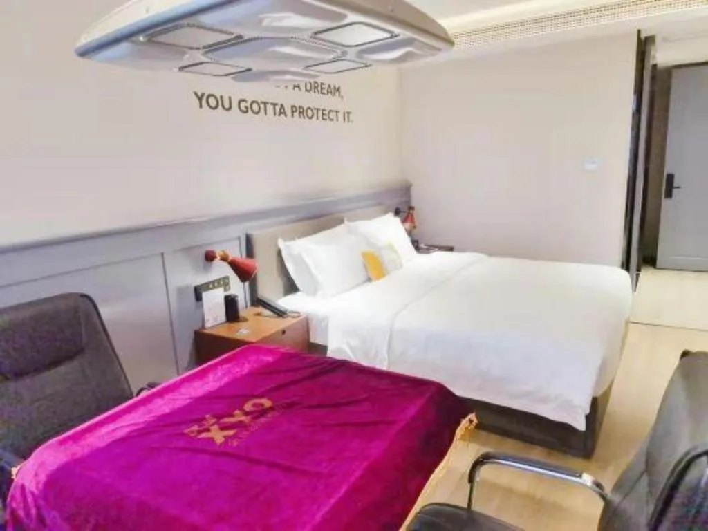 Bed in Premier City Comfort Hotel Suizhou Wuyue Plaza