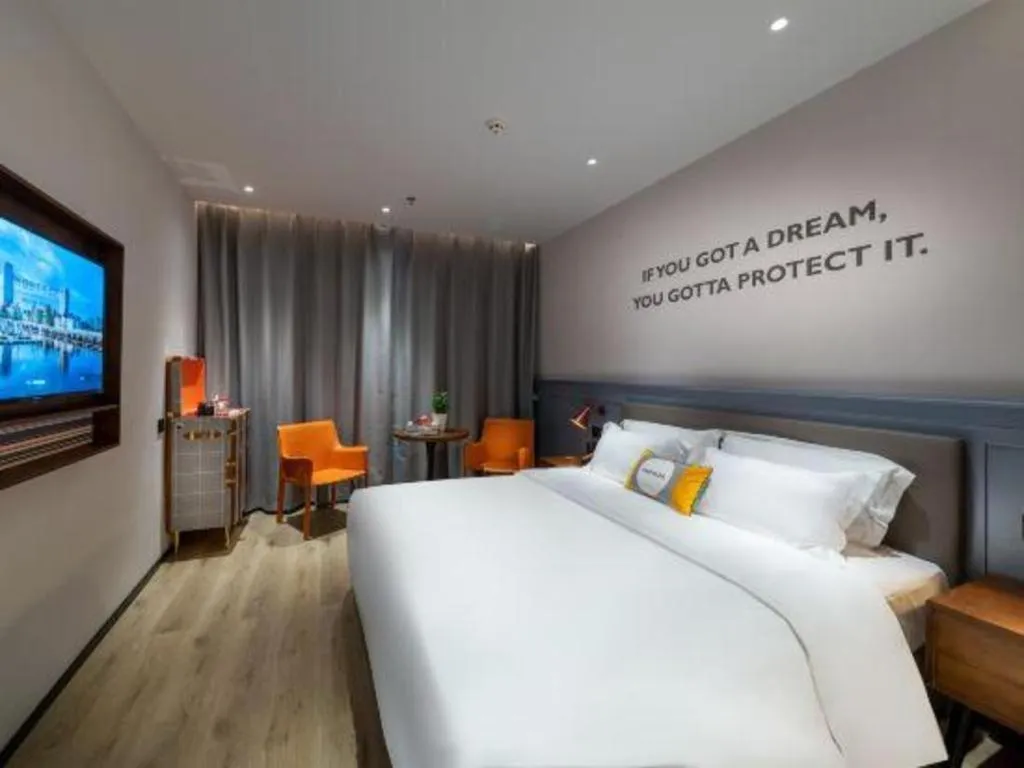 Bed in Premier City Comfort Hotel Suizhou Wuyue Plaza