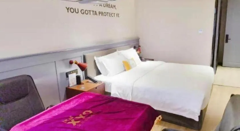 Bed in Premier City Comfort Hotel Suizhou Wuyue Plaza