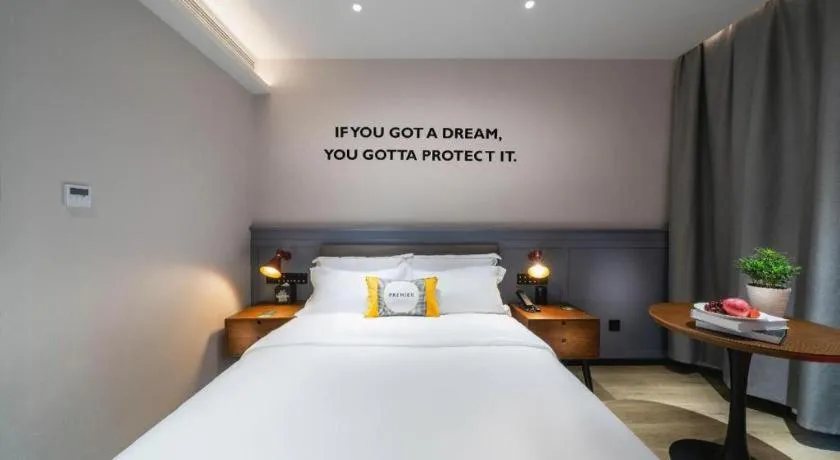 Bed in Premier City Comfort Hotel Suizhou Wuyue Plaza