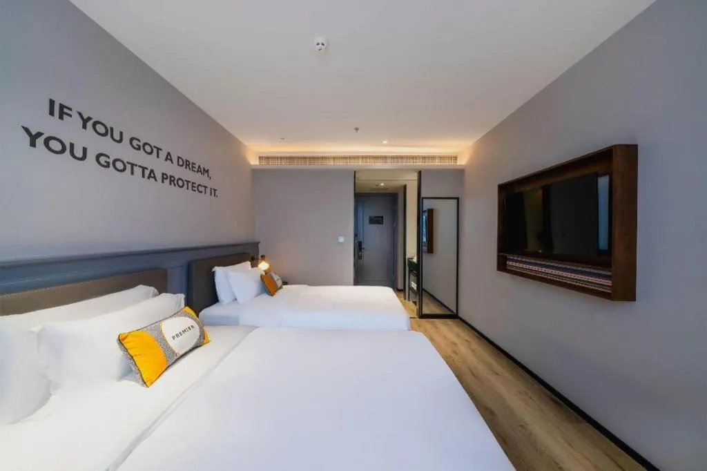 Bed in Premier City Comfort Hotel Suizhou Wuyue Plaza