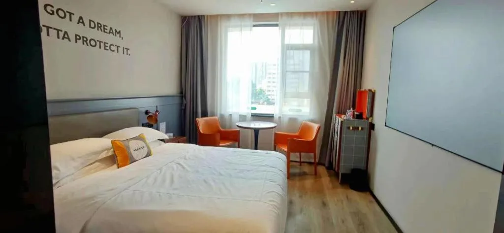 Bed in Premier City Comfort Hotel Suizhou Wuyue Plaza