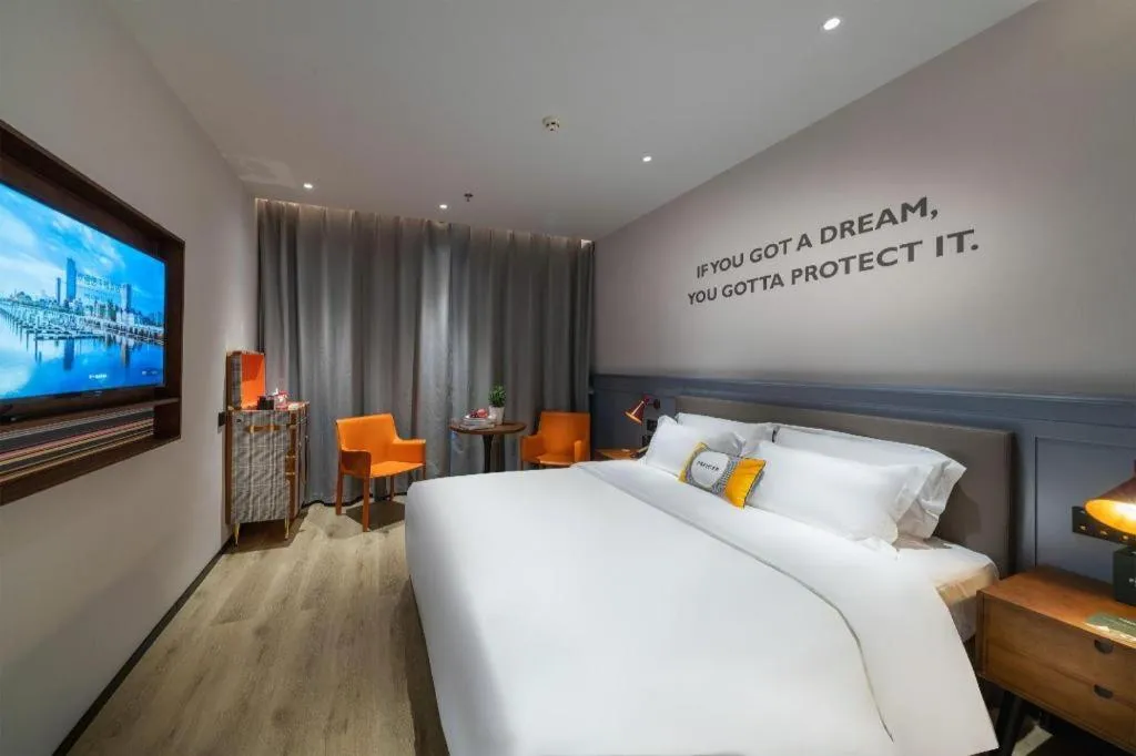 Bed in Premier City Comfort Hotel Suizhou Wuyue Plaza