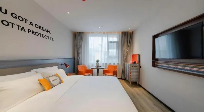 Bed in Premier City Comfort Hotel Suizhou Wuyue Plaza