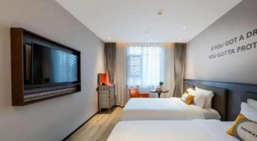 Bed in Premier City Comfort Hotel Suizhou Wuyue Plaza