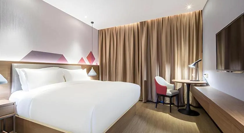 Bed in Borrman Hotel Wuzhou Teng County