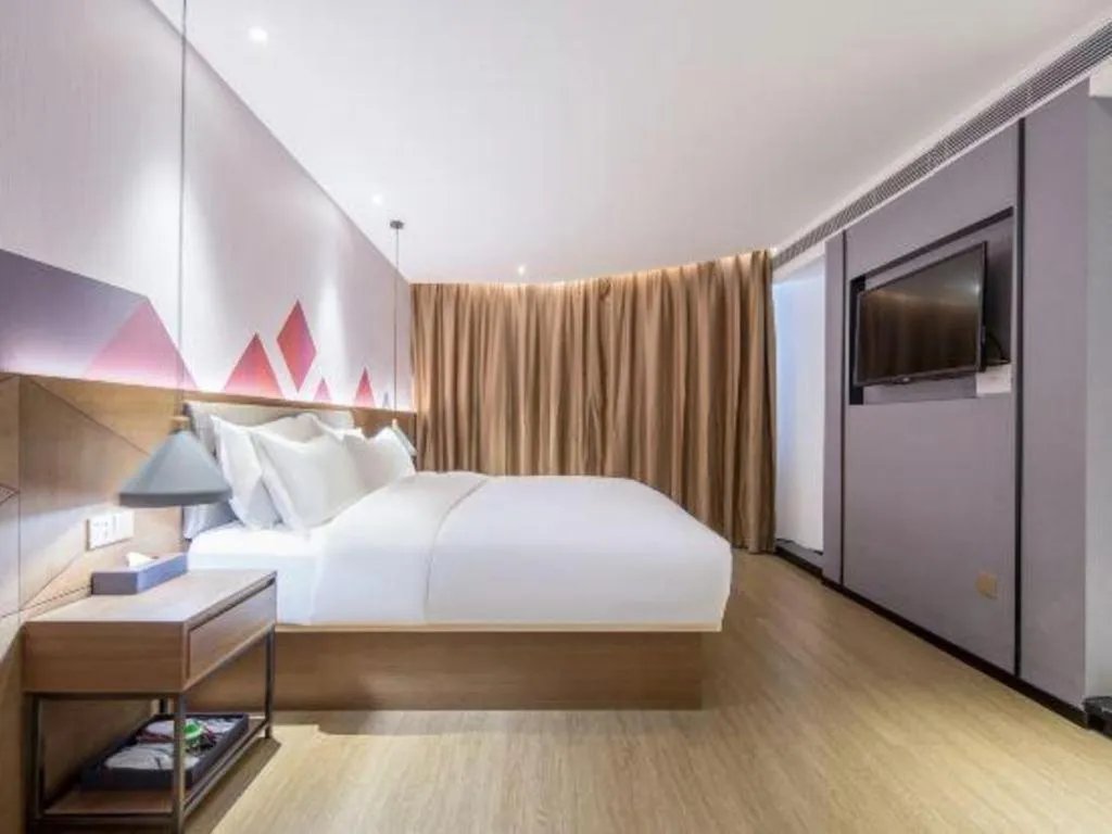 Bed in Borrman Hotel Wuzhou Teng County