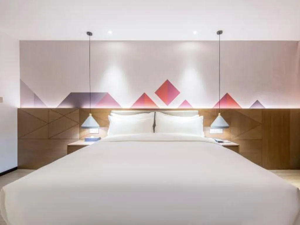 Bed in Borrman Hotel Wuzhou Teng County