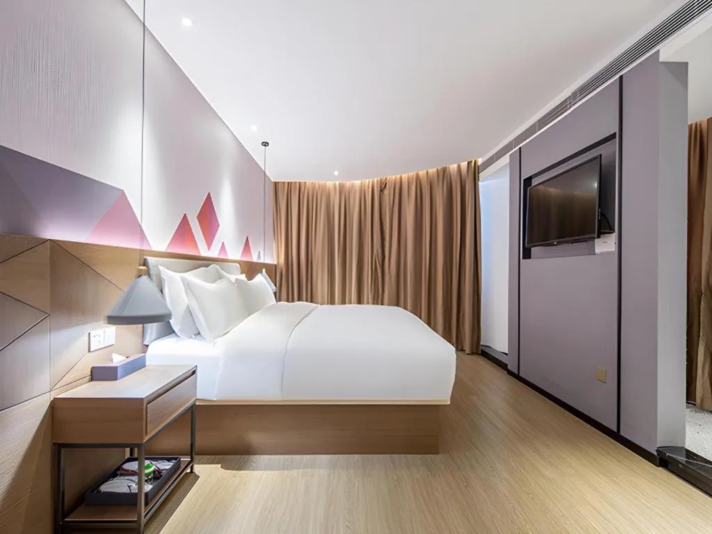 Bed in Borrman Hotel Wuzhou Teng County