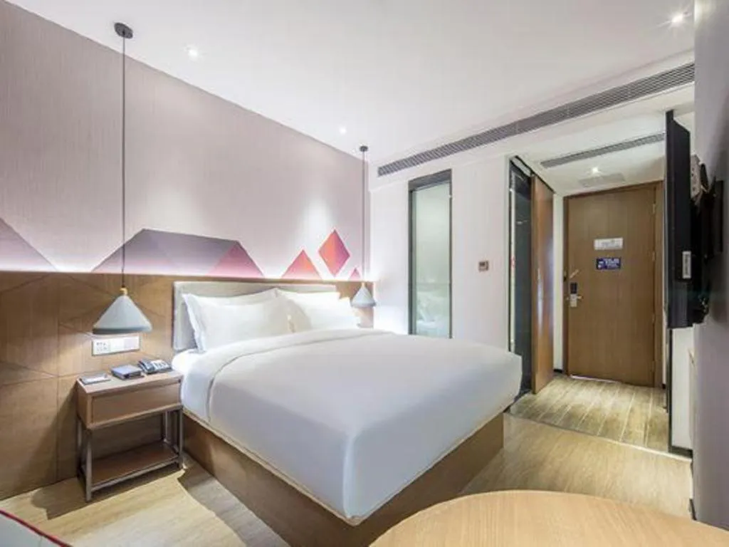 Bed in Borrman Hotel Wuzhou Teng County