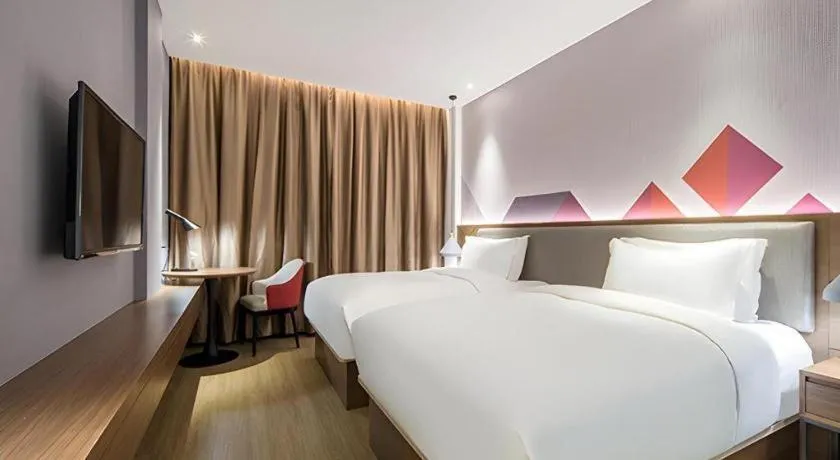 Bed in Borrman Hotel Wuzhou Teng County