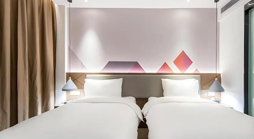 Bed in Borrman Hotel Wuzhou Teng County