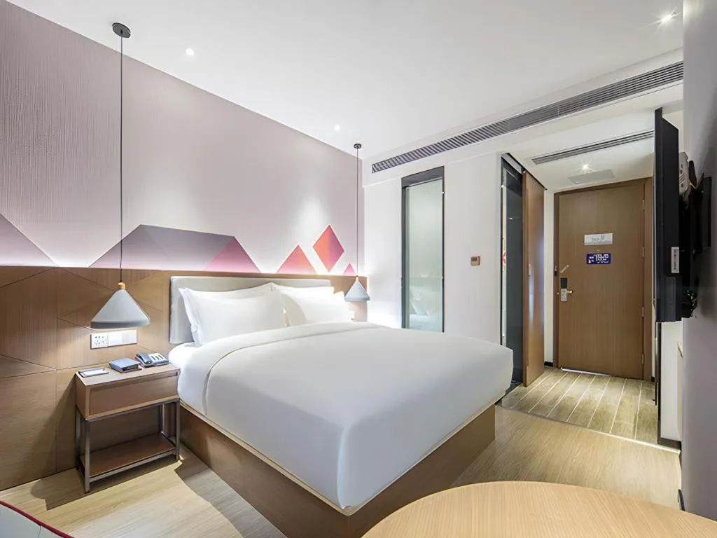 Bed in Borrman Hotel Wuzhou Teng County