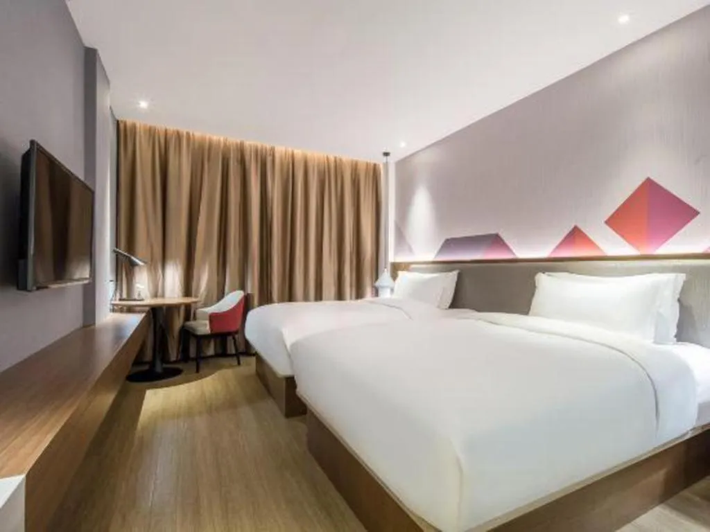 Bed in Borrman Hotel Wuzhou Teng County