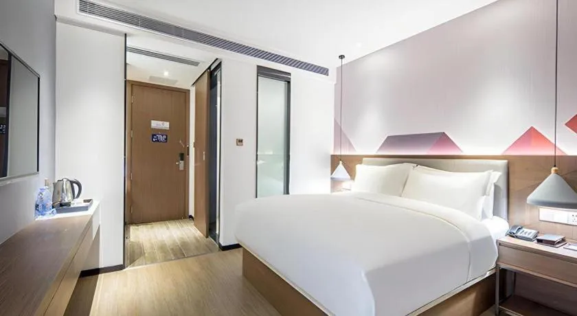 Bed in Borrman Hotel Wuzhou Teng County