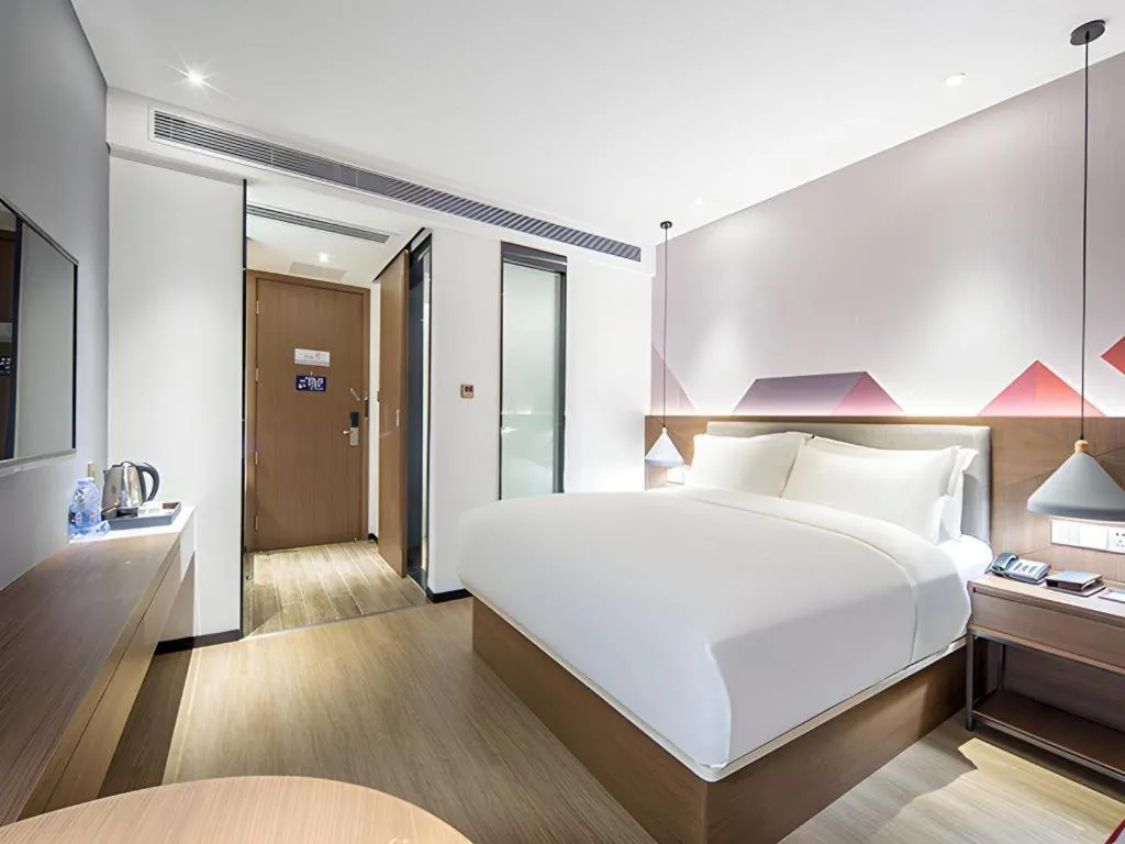 Bed in Borrman Hotel Wuzhou Teng County