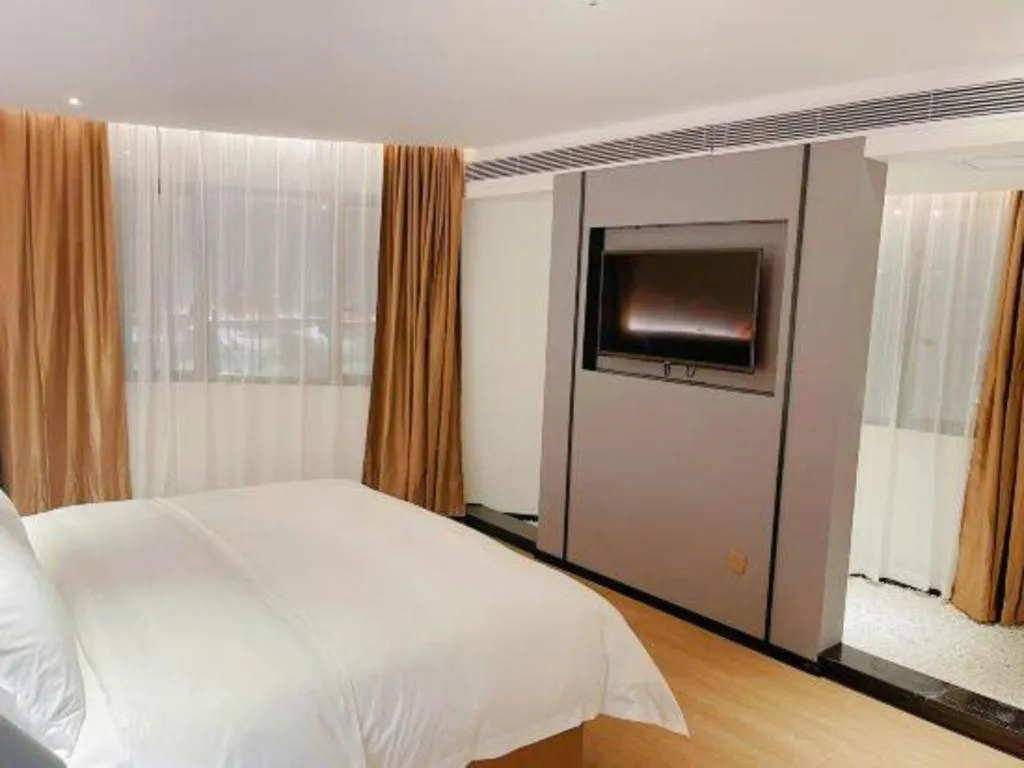 Bed in Borrman Hotel Wuzhou Teng County