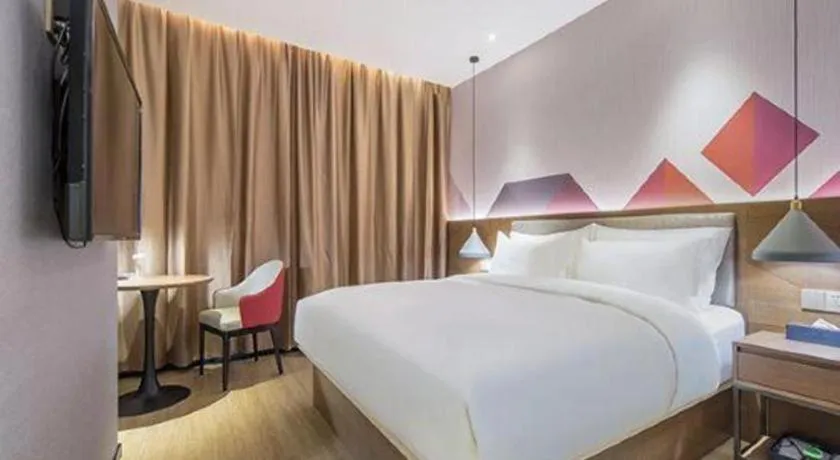 Bed in Borrman Hotel Wuzhou Teng County