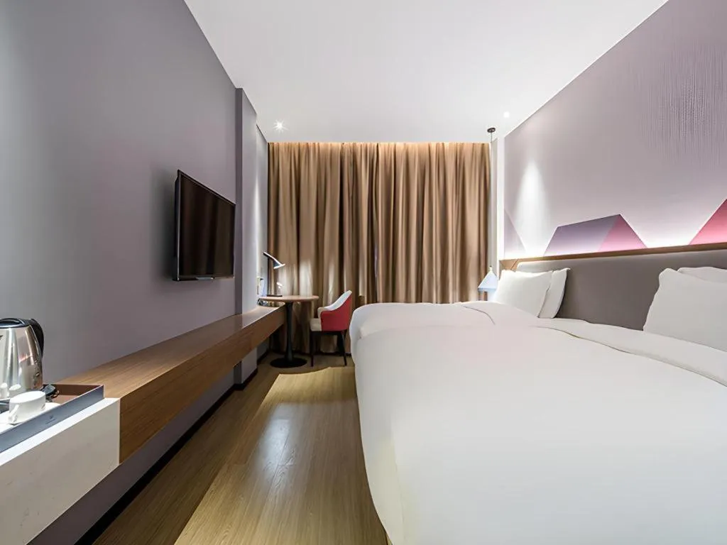 Bed in Borrman Hotel Wuzhou Teng County