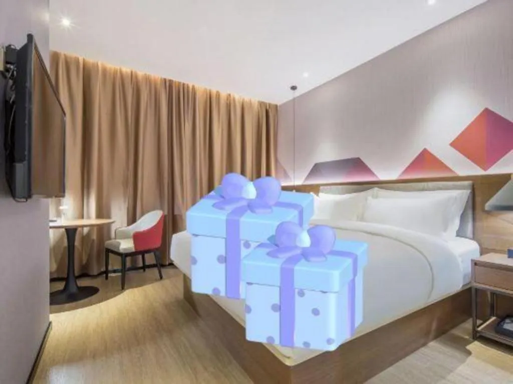 Bed in Borrman Hotel Wuzhou Teng County