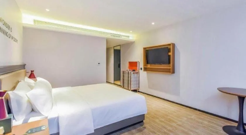 Bed in Premier City Comfort Hotel Wuhan Hankou Railway Station Changgang Road Metro Station