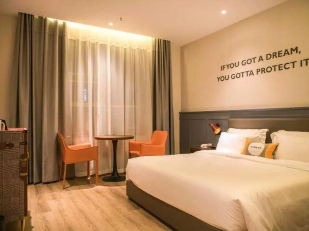 Bed in Premier City Comfort Hotel Wuhan Hankou Railway Station Changgang Road Metro Station