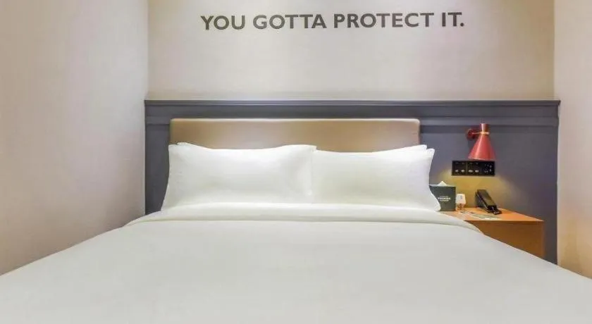 Bed in Premier City Comfort Hotel Wuhan Hankou Railway Station Changgang Road Metro Station