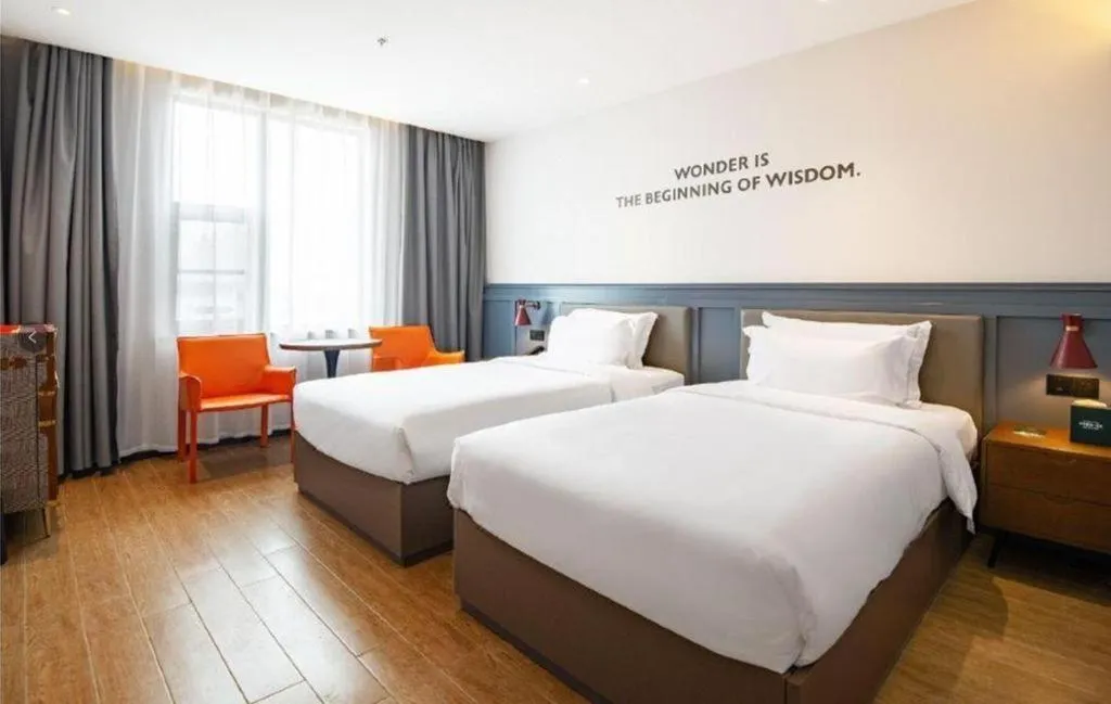 Bed in Premier City Comfort Hotel Wuhan Hankou Railway Station Changgang Road Metro Station