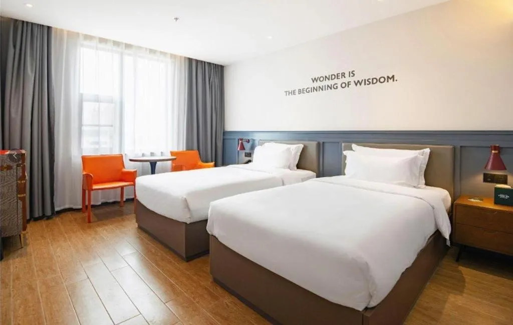 Bed in Premier City Comfort Hotel Wuhan Hankou Railway Station Changgang Road Metro Station
