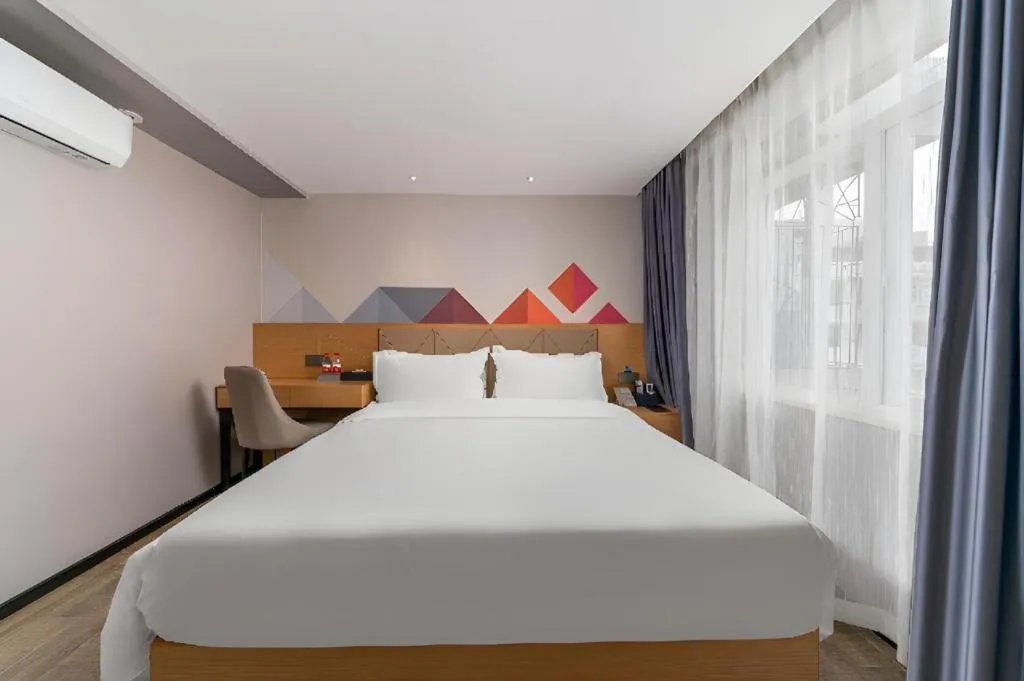 Bed in Borrman Hotel Guangzhou Shisanhang Ximenkou Metro Station