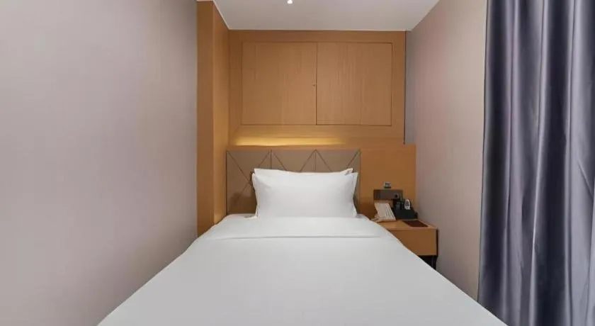Bed in Borrman Hotel Guangzhou Shisanhang Ximenkou Metro Station