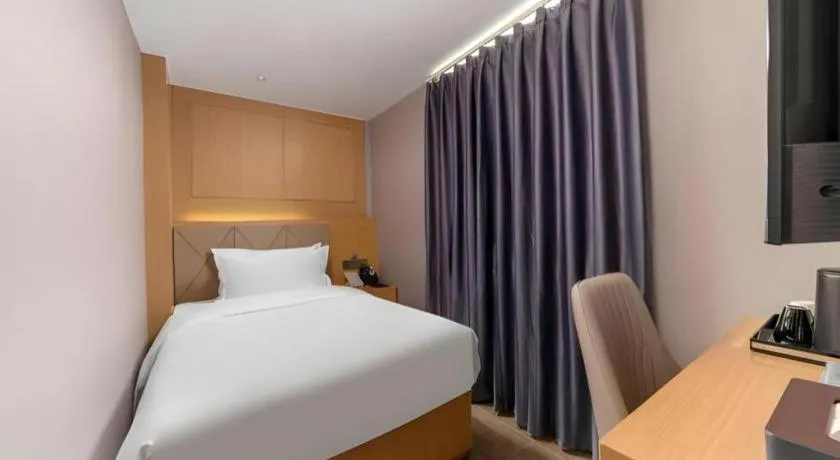 Bed in Borrman Hotel Guangzhou Shisanhang Ximenkou Metro Station