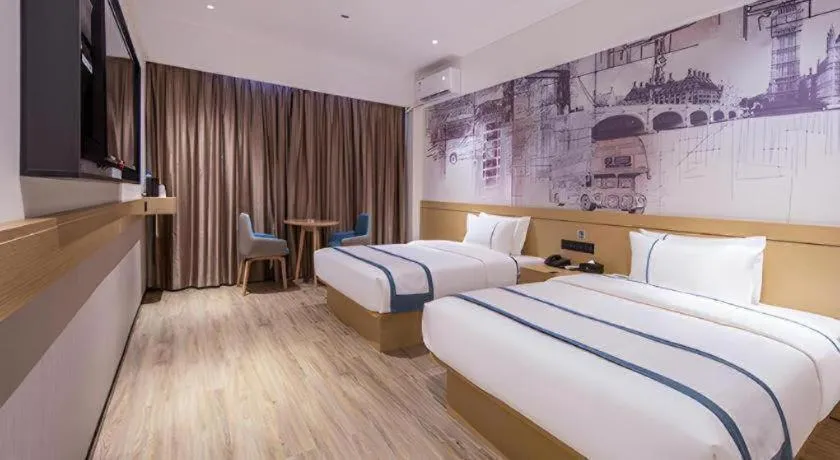 Bed in City Comfort Inn Liuzhou Liudong New District Hualing Youlinghui